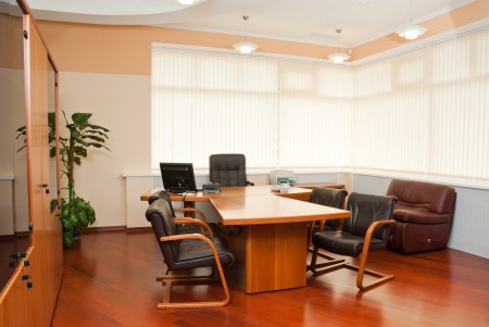 Modern office interior - director's office with a place for meetings